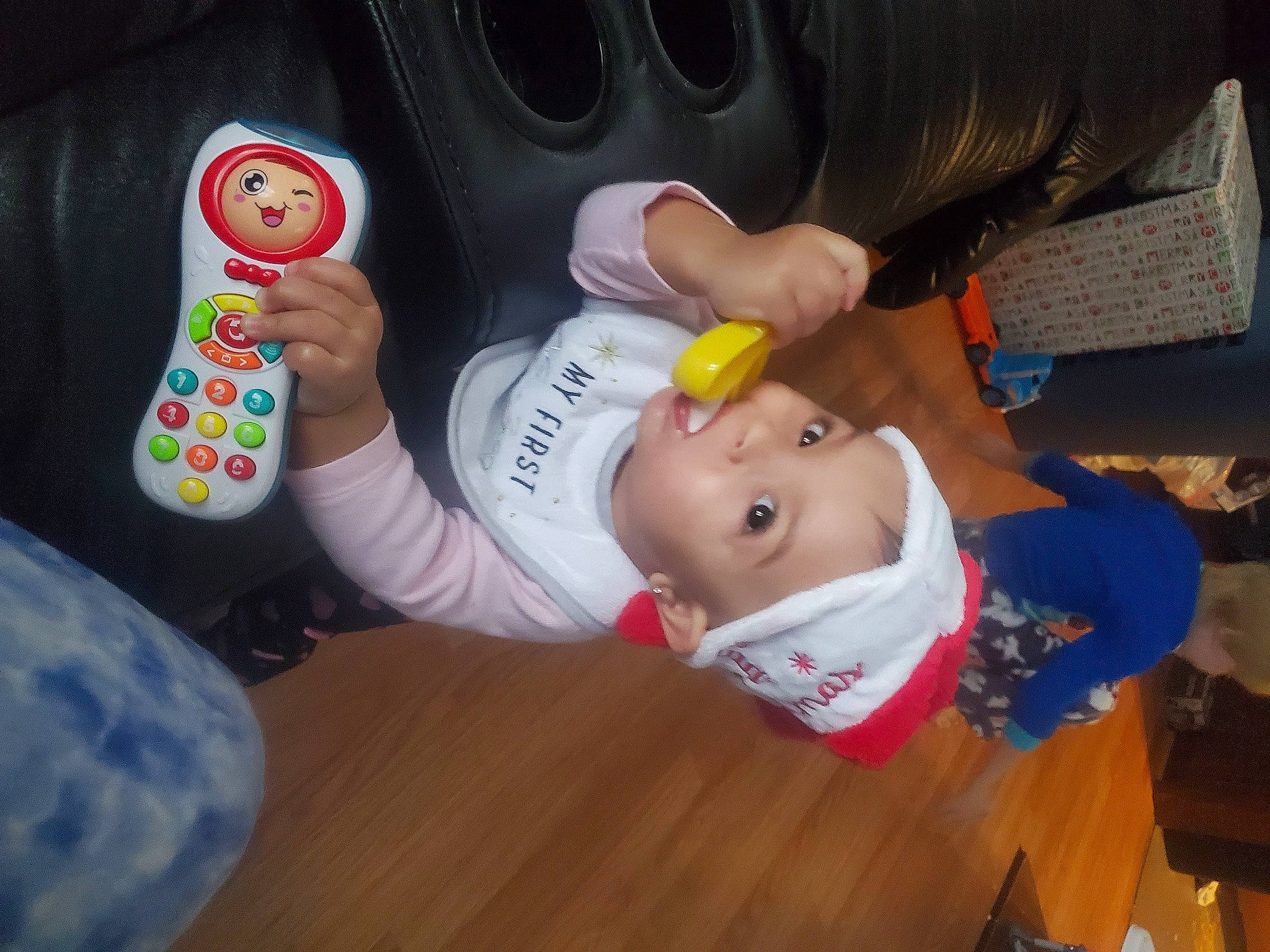 Amelie joined the competition — help win amazing prizes! baby, baby_products, baby_toddler_clothing, carmine, child, drinkware, finger, flooring, foot, hardwood, headwear, nail, person, plastic, play, remote_control, sock, thumb, toddler, walking_shoe