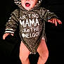 baby, hoodie, smiling, happy, infant, clothing, cute, child, portrait, apparel, expression, black_background, hood, one_piece, baby_legs, baby_hands, joy, casual_wear, indoor, face