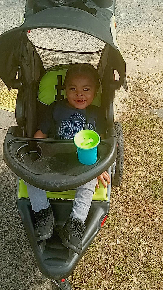 Kingsten joined the competition — help win amazing prizes! automotive_wheel_system, baby, baby_carriage, baby_products, chair, child, comfort, fun, grass, joy, motor_vehicle, people_in_nature, person, personal_protective_equipment, play, product, recreation, sitting, smile, tire