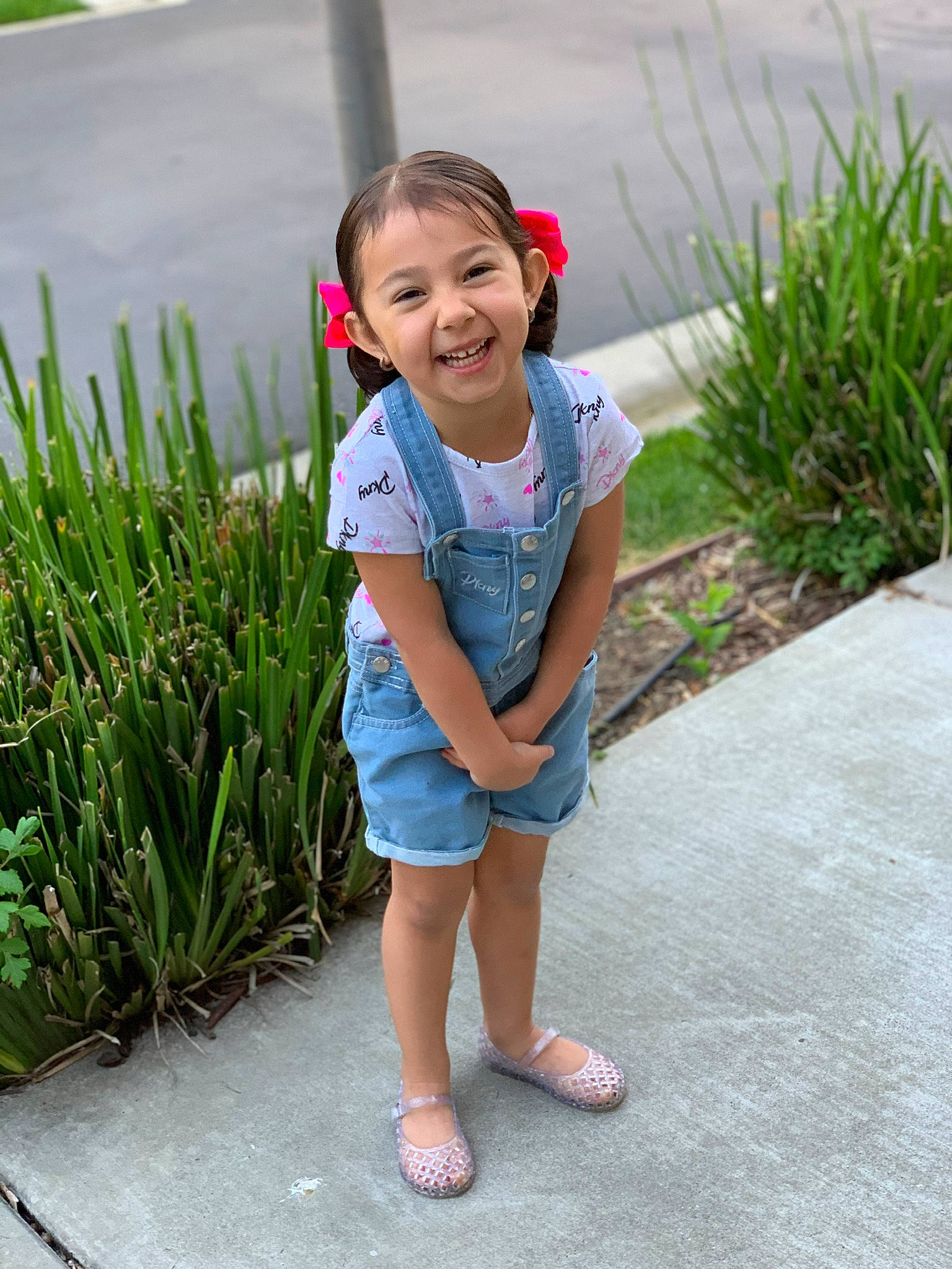 Juliet is registered to the contest to win money with this photo: beauty, botany, child, facial_expression, flower, fun, garden, grass, grass_family, happy, jeans, joy, leisure, people, person, plant, play, skin, smile, summer