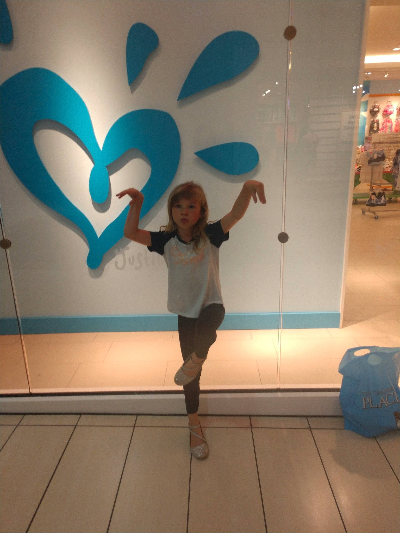 Adele is registered to the contest to win money with this photo: art, blue, ceiling, floor, flooring, fun, happy, leg, leisure, mural, person, smile, vacation, wall, world