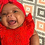 Paizlie joined the competition — help win amazing prizes! baby, baby_girl, bright_colors, cheerful, child, close_up, cute, fabric, face, happy, headband, infant, lying_down, orange_clothing, patterned_blanket, portrait, smiling, soft_skin, tongue_out, young