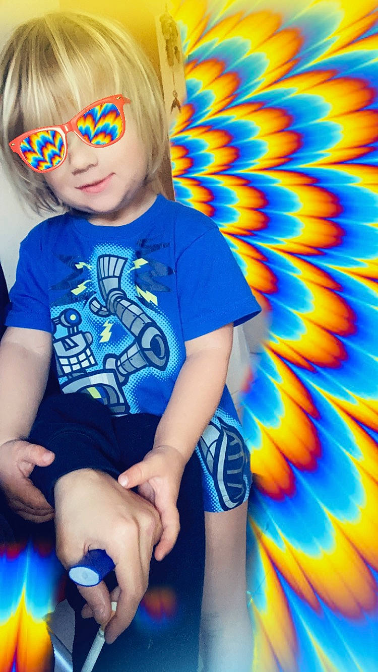 Nicholas is registered to the contest to win money with this photo: aqua, azure, baby_toddler_clothing, beauty, blue, cool, electric_blue, flower, goggles, happy, light, orange, organ, people, person, photograph, shorts, sleeve, textile, toddler