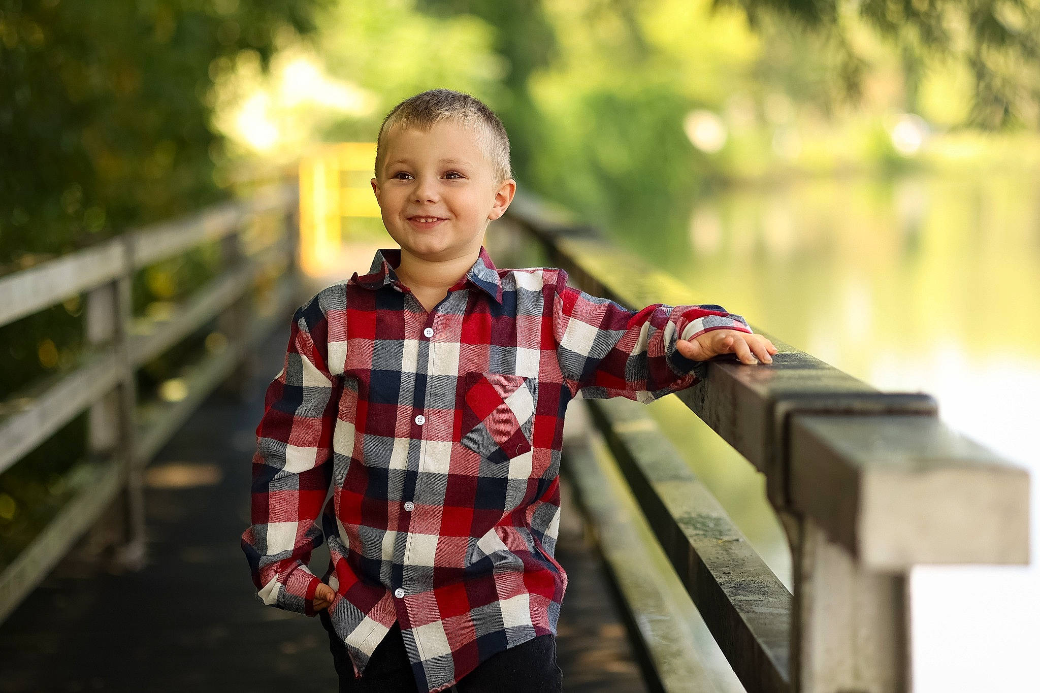 Mitchell is registered to the contest to win money with this photo: dress_shirt, facial_expression, flash_photography, fun, grass, happy, human, joy, leisure, people_in_nature, person, plaid, plant, sleeve, smile, standing, summer, tartan, temple, travel