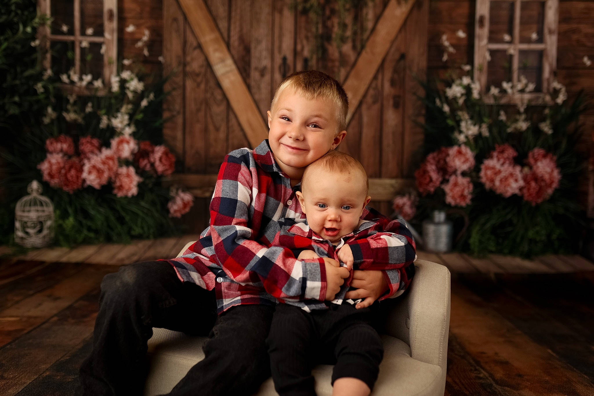 Mitchell is registered to the contest to win money with this photo: baby, child, christmas, event, flash_photography, fun, grass, happy, holiday, joy, lap, leaf, leisure, person, plaid, plant, sitting, smile, t_shirt, toddler