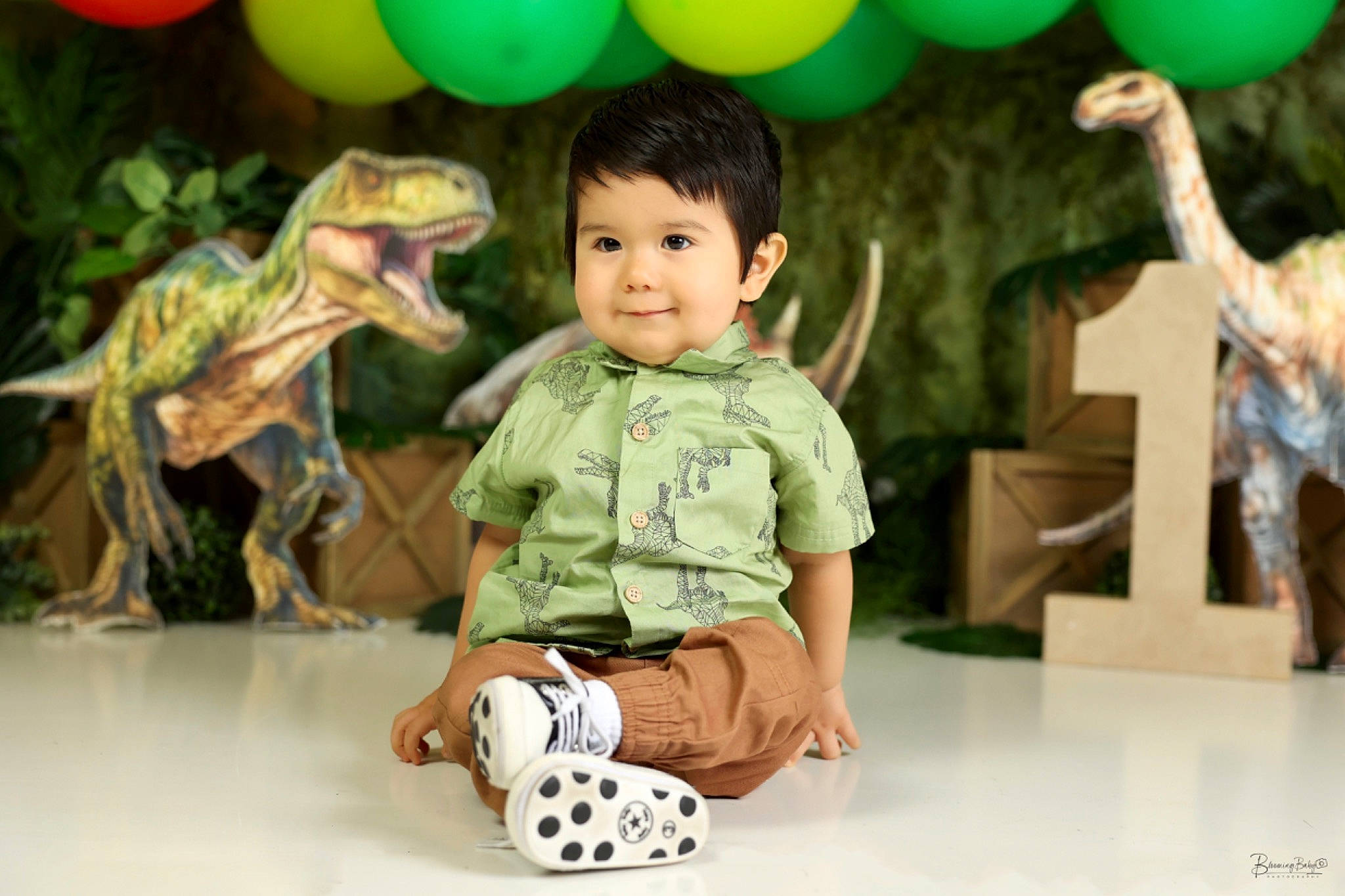 Marcus is registered to the contest to win money with this photo: adaptation, baby, balloon, child, event, fun, green, happy, joy, leisure, mammal, organ, party_supply, person, photograph, smile, snapshot, social_group, toddler, toy