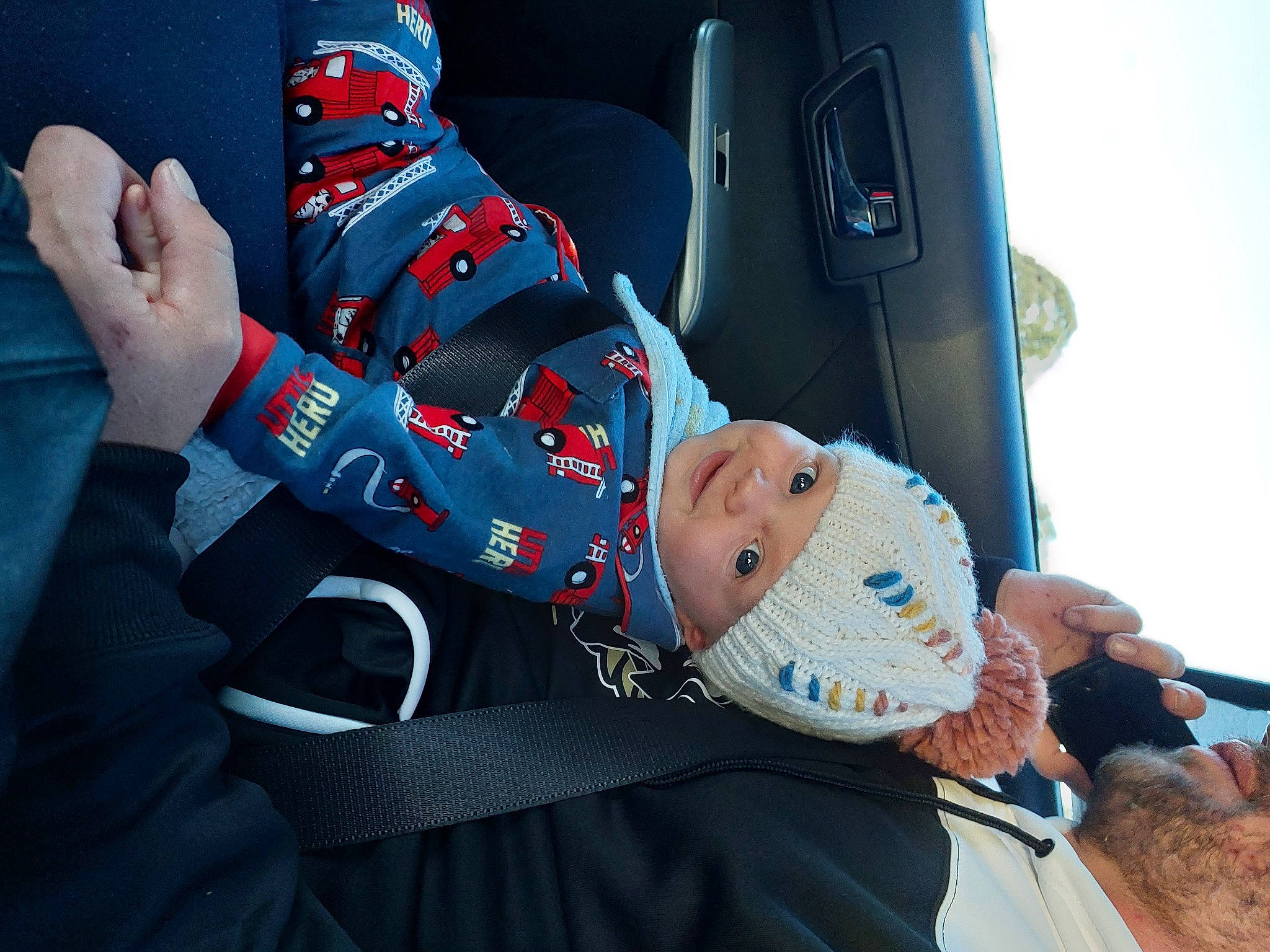 George joined the competition — help win amazing prizes! auto_part, automotive_design, automotive_exterior, baby, car_seat, carmine, child, comfort, elbow, electric_blue, family_car, gesture, hat, headwear, joy, motor_vehicle, person, sky, sleeve, toddler