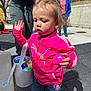 Kathleen joined the competition — help win amazing prizes! toddler, child, pink_jacket, plastic_egg, bucket, colorful_eggs, outdoor, playground, adult, concrete, daylight, jeans, person, holding, activity, casual_clothing, spring, fun, family, event