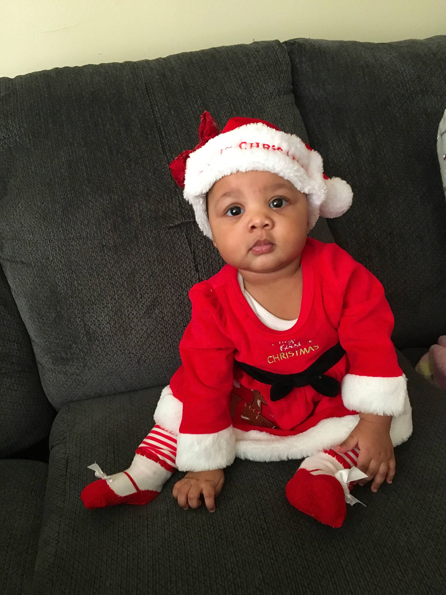 Khalia joined the competition — help win amazing prizes! baby, child, christmas, christmas_eve, fictional_character, headwear, holiday, person, red, santa_claus, toddler