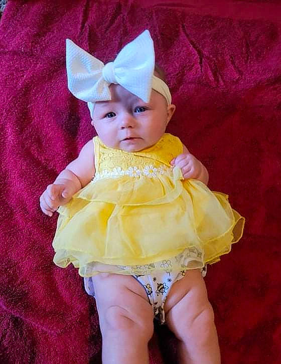 Willow is registered to the contest to win money with this photo: baby, baby_toddler_clothing, costume_hat, day_dress, dress, embellishment, eye, face, fawn, happy, head, headgear, headwear, human_body, magenta, mythical_creature, person, pink, purple, skin