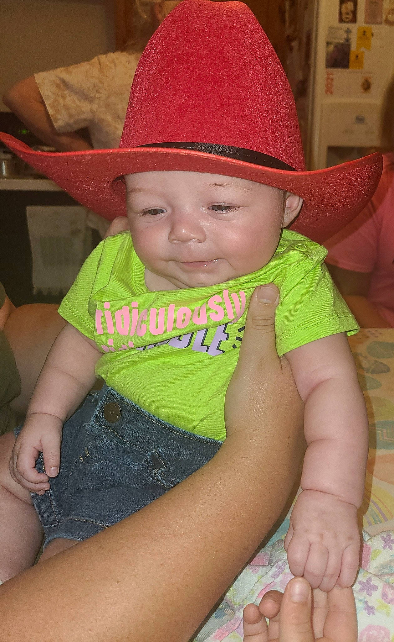 Willow is registered to the contest to win money with this photo: baby, baby_toddler_clothing, cap, cheek, child, facial_expression, fedora, finger, fun, happy, hat, headgear, headwear, human_body, mouth, organ, person, pink, product, skin