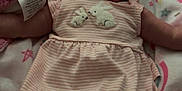 Amelia joined the competition — help win amazing prizes! baby, blanket, bunny_pattern, child, cozy, cute, face, headband, indoors, infant, lying_down, newborn, person, pink_clothing, portrait, resting, sleepwear, soft_texture, toddler, warm
