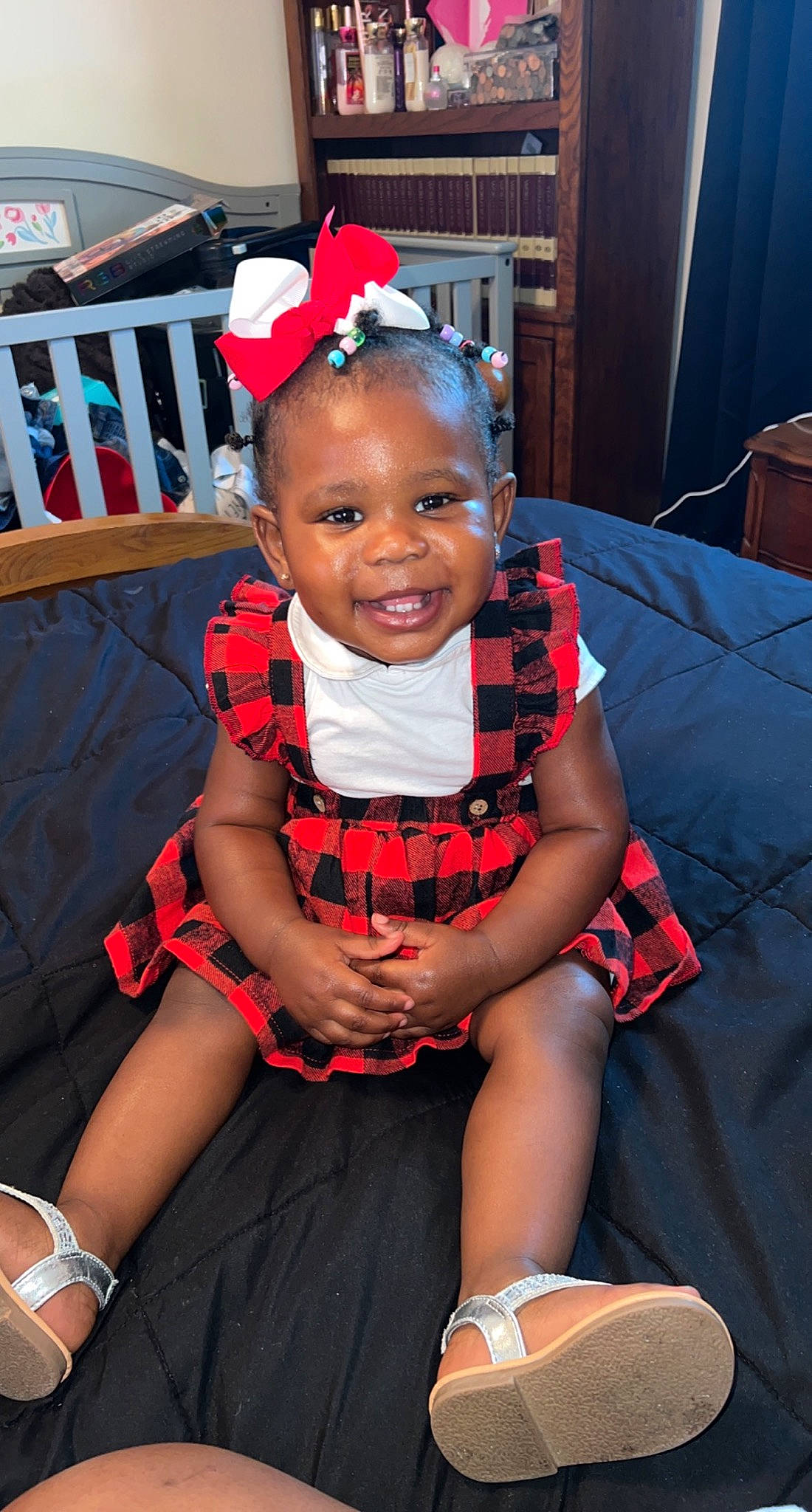 Raelynn is registered to the contest to win money with this photo: chair, child, costume, dress, electric_blue, event, fashion_accessory, formal_wear, fun, happy, joy, lap, magenta, person, pink, red, sitting, skin, smile, sock