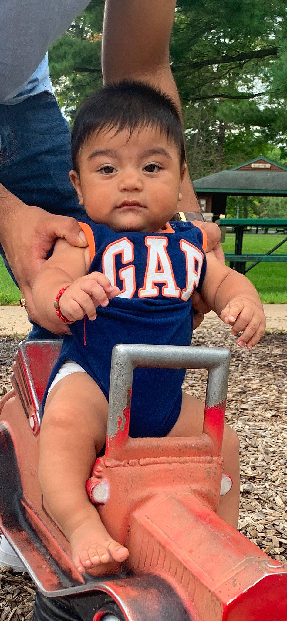 Javier joined the competition — help win amazing prizes! baby, baby_toddler_clothing, child, electric_blue, face, finger, fun, grass, happy, human_leg, leisure, people_in_nature, person, play, recreation, sitting, t_shirt, thigh, thumb, toddler