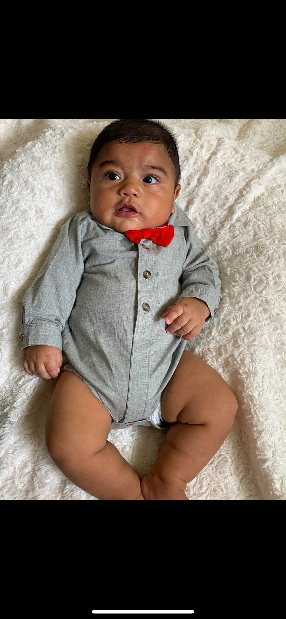 Javier is registered to the contest to win money with this photo: baby, baby_toddler_clothing, cheek, chest, dress, eye, flash_photography, hand, human_body, iris, jeans, lip, neck, nose, person, skin, sleeve, stomach, thigh, toddler