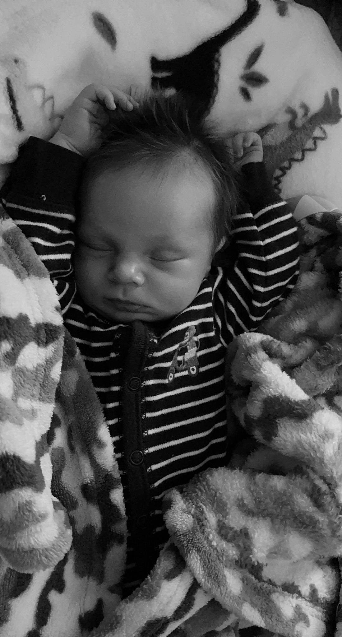 Jaxsyn joined the competition — help win amazing prizes! baby, baby_toddler_clothing, black, black_and_white, cheek, child, comfort, cool, face, happy, human, monochrome, monochrome_photography, pattern, person, skin, sleeve, style, toddler, tree