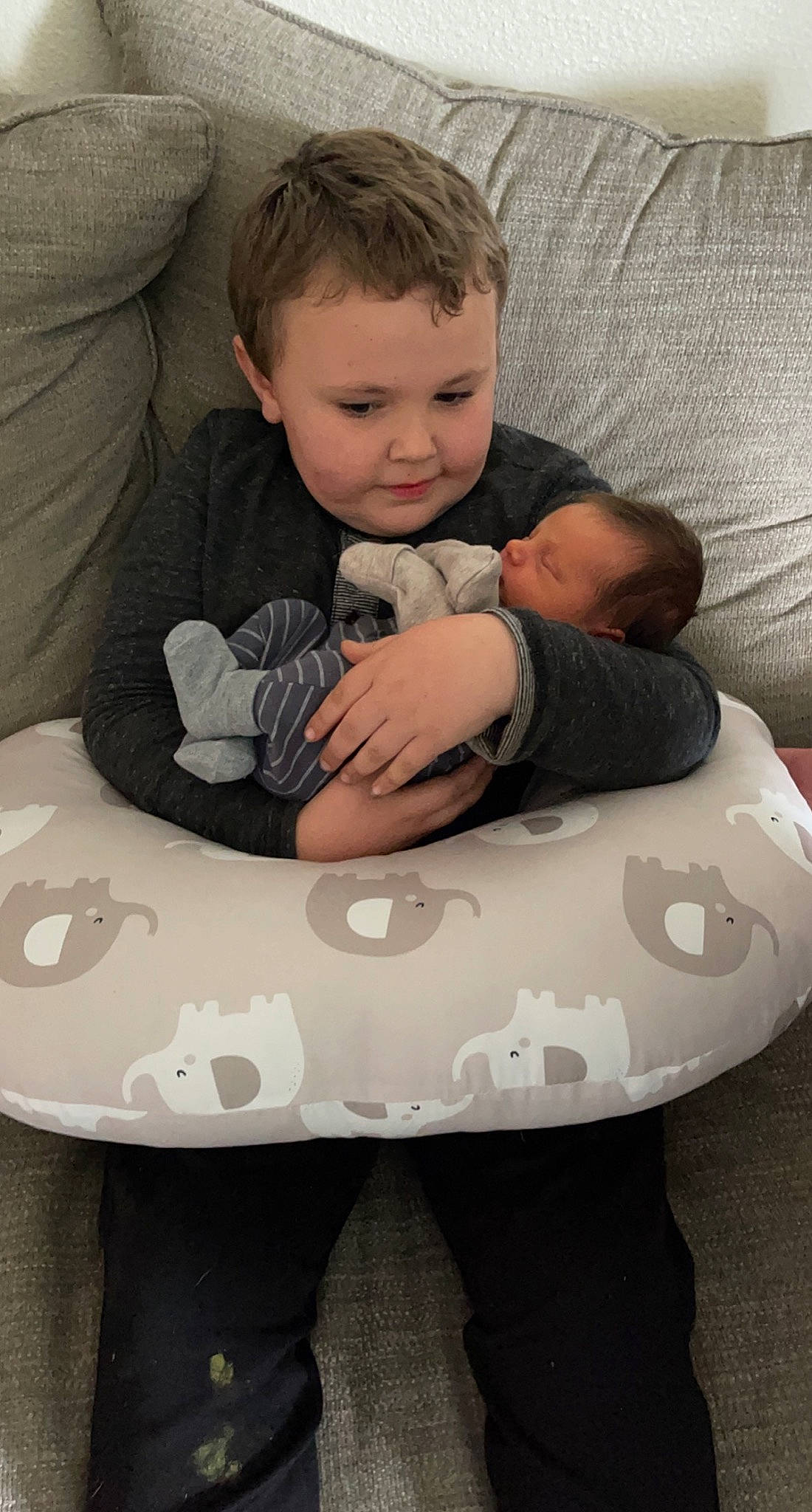 Jaxsyn joined the competition — help win amazing prizes! arm, baby, baby_products, baby_toddler_clothing, child, comfort, couch, finger, floor, flooring, fun, hairstyle, happy, lap, organ, person, sitting, t_shirt, table, thigh