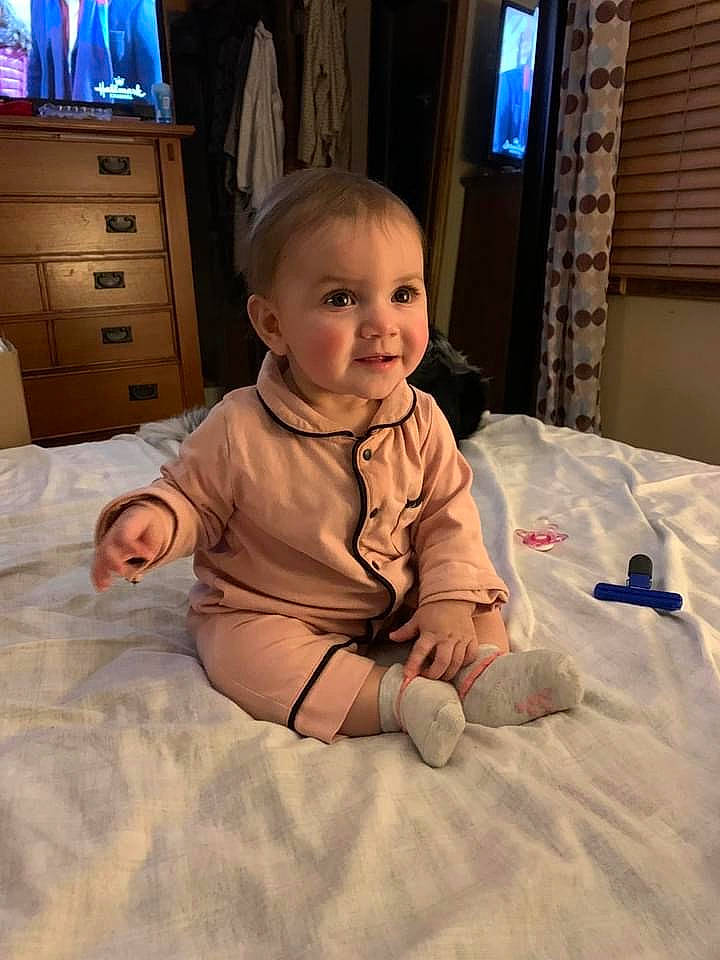 Rosalyn joined the competition — help win amazing prizes! baby, blue, cabinetry, chest_of_drawers, comfort, drawer, dresser, eye, floor, flooring, fun, head, leg, lighting, person, skin, smile, television, toddler, window
