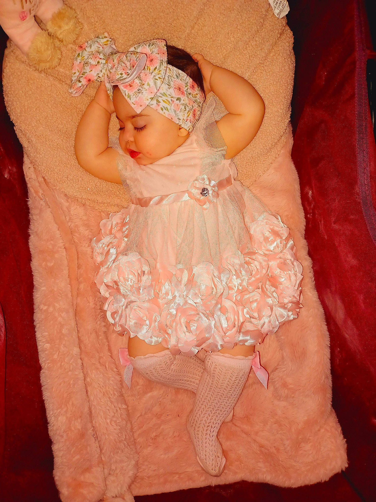 Yvonne joined the competition — help win amazing prizes! arm, baby, baby_sleeping, baby_toddler_clothing, child, comfort, dress, embellishment, finger, hand, headband, headgear, headwear, helmet, human_body, leg, lip, person, pink, skin