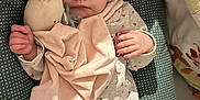 Livia a rejoint le concours — aidez-le/la à gagner de superbes lots ! baby, baby_lounger, blanket, bunny, child, cozy, cute, face, hand, indoor, infant, nursery, onesie, pacifier, peaceful, polka_dot, rest, sleeping, soft_toy, stuffed_animal