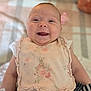 Isabelle joined the competition — help win amazing prizes! baby, infant, smiling, face, bib, clothing, pacifier, blanket, soft_toys, cute, happy, child, portrait, young, indoor, skin, head, expression, person, newborn