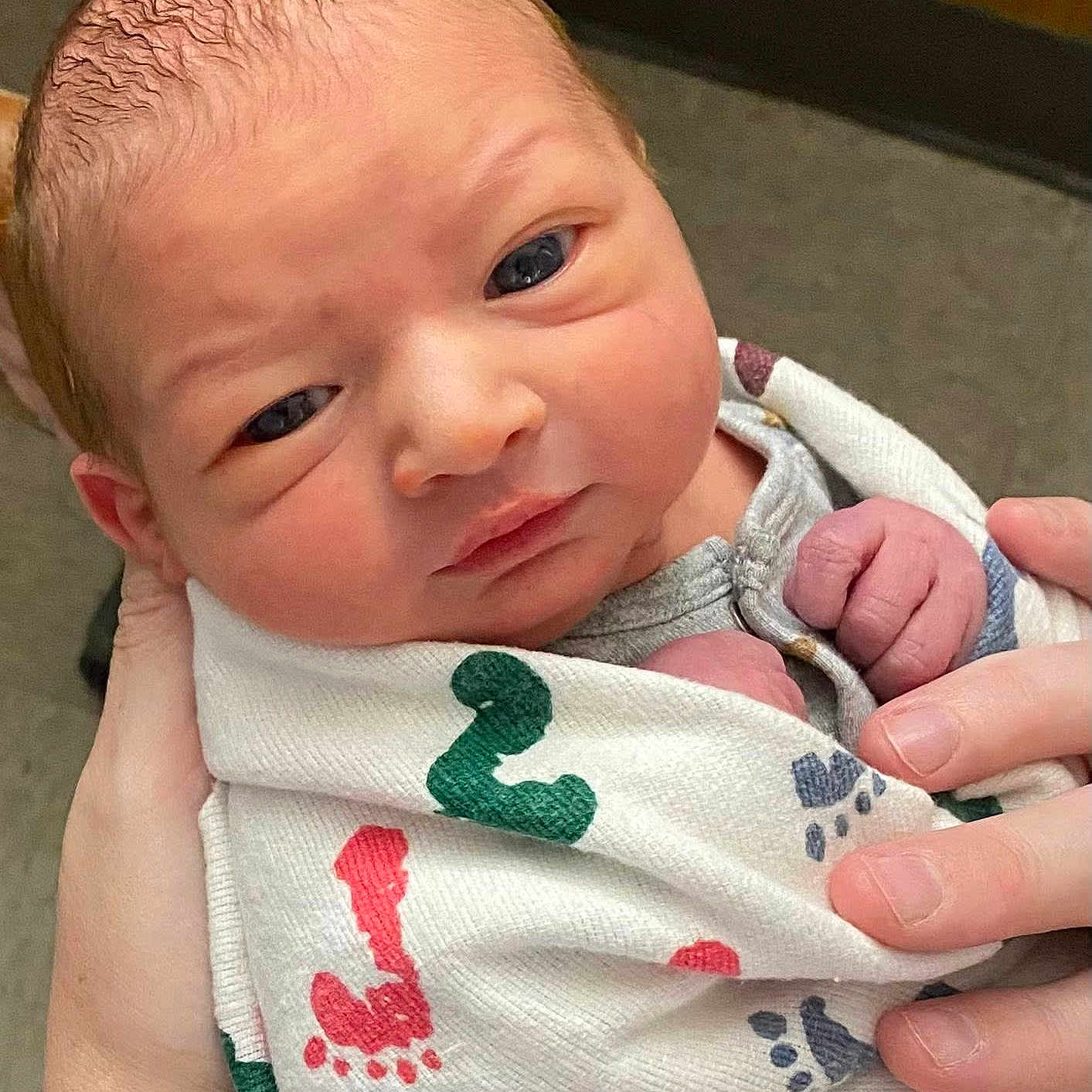 Matthew is registered to the contest to win money with this photo: baby, baby_clothes, blanket, closeup, clothing, cute, face, footprint_pattern, gentle, hands, human, indoor, infant, newborn, newborn_baby, person, portrait, skin, tender, wrapped