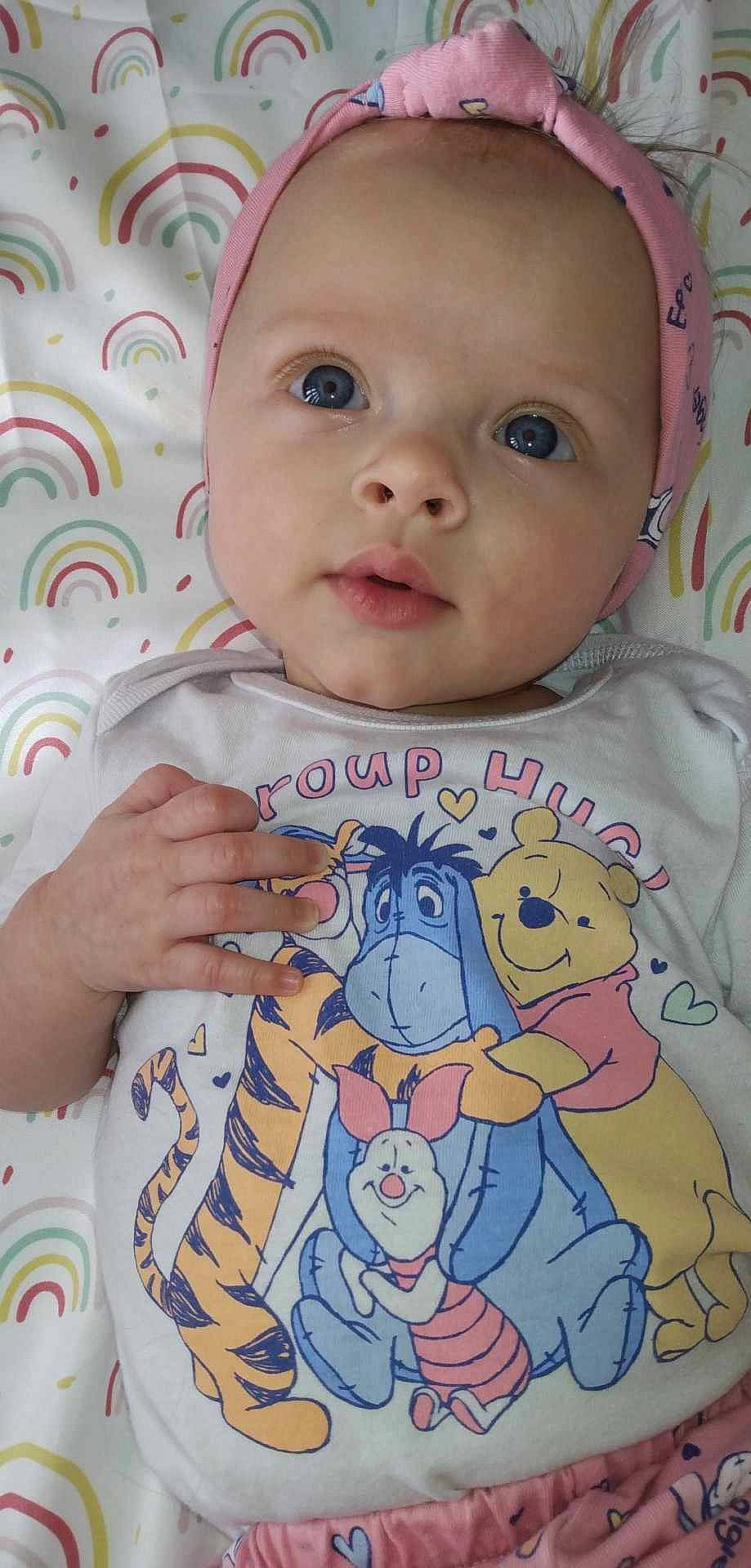 Zendaya is registered to the contest to win money with this photo: baby, baby_toddler_clothing, cheek, child, eyelash, happy, linens, lip, nose, organ, pattern, person, pink, product, skin, sleeve, t_shirt, textile, toddler, top