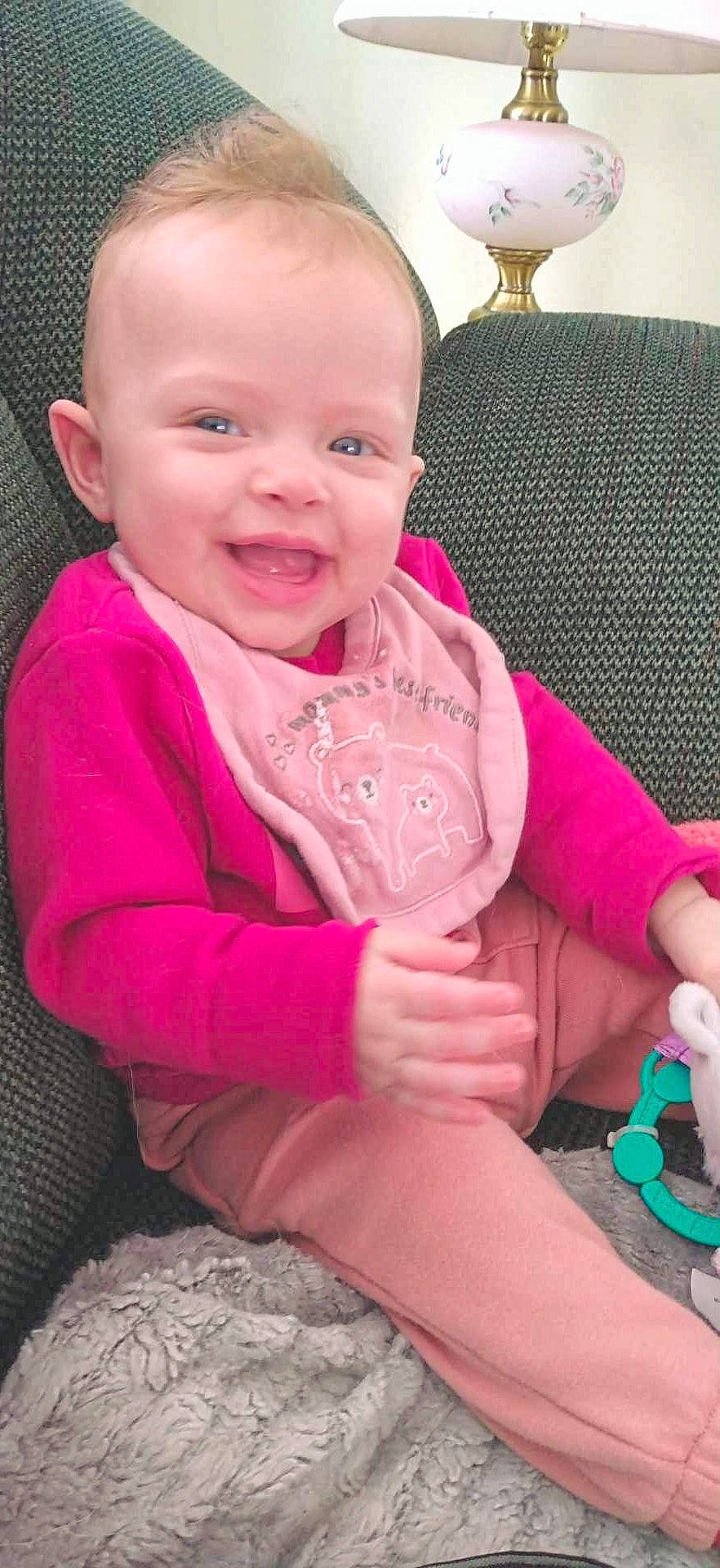 Zendaya is registered to the contest to win money with this photo: arm, baby, baby_toddler_clothing, cheek, child, comfort, finger, gesture, happy, joy, lip, magenta, nail, nose, person, pink, skin, sleeve, smile, t_shirt