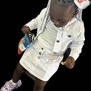 Corasia is registered to the contest to win money with this photo: accessories, bag, bodypart, child, clothing, coat, face, female, finger, footwear, girl, hand, handbag, hat, head, longsleeve, person, shoe, sleeve, sneaker