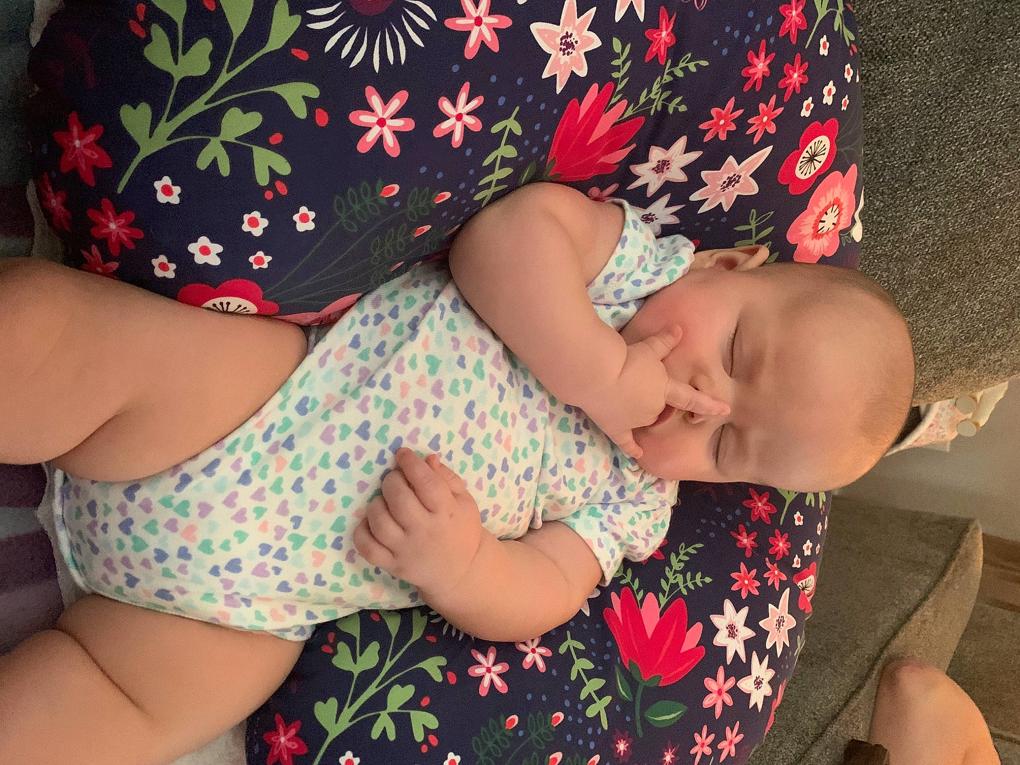 Emmy joined the competition — help win amazing prizes! abdomen, arm, baby, black_hair, child, finger, hand, interaction, leg, person, sitting, sleep, thigh, toddler