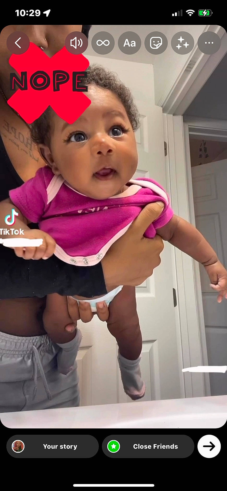 Ka Mya is registered to the contest to win money with this photo: baby_toddler_clothing, black_hair, cheek, cool, eye, eyelash, face, gesture, hair, hand, happy, headgear, magenta, mouth, person, pink, purple, skin, sleeve, toddler