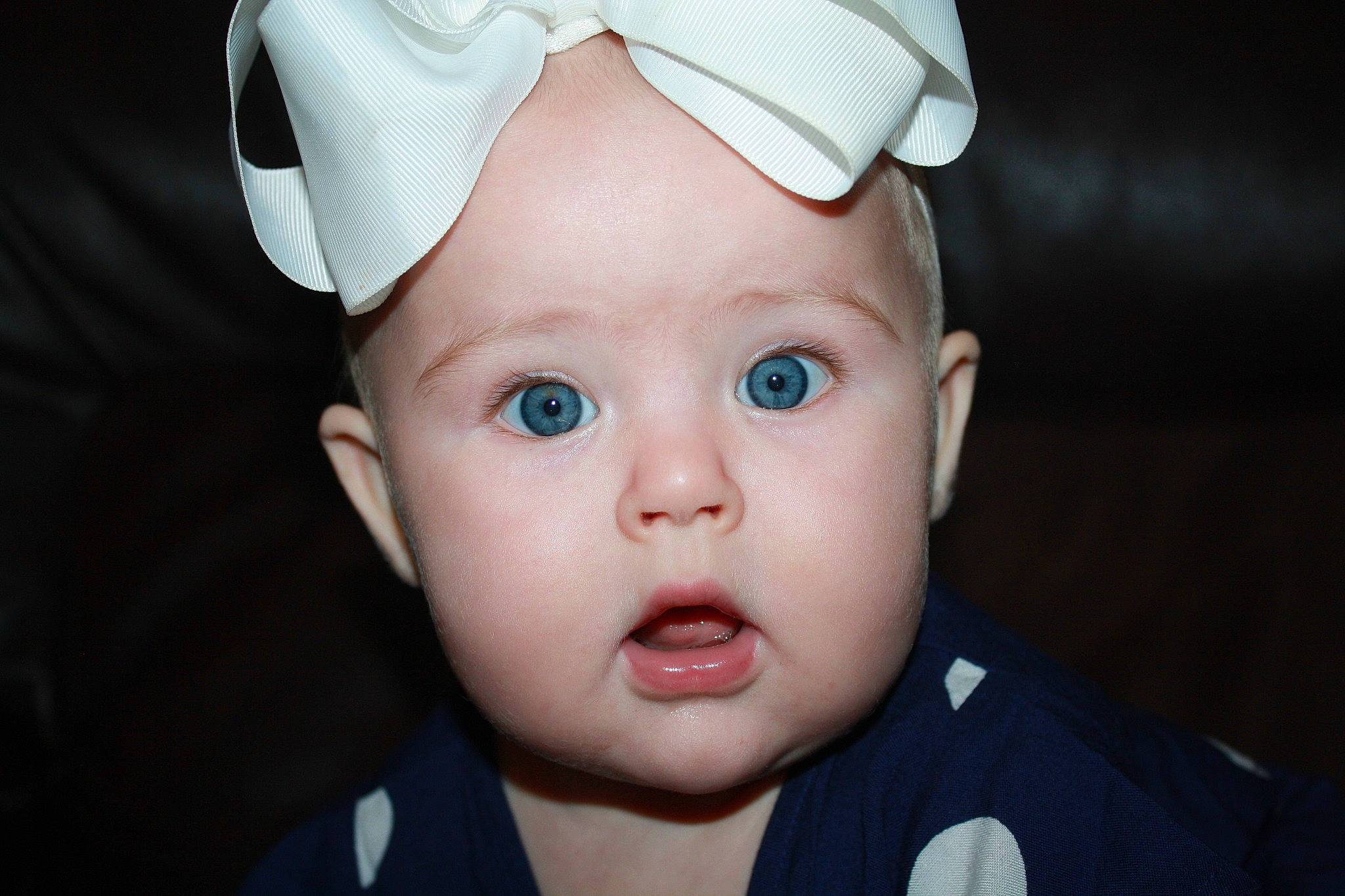 Scarlett joined the competition — help win amazing prizes! baby, cheek, child, chin, close_up, ear, eye, eyebrow, eyelash, face, forehead, head, headgear, headwear, lip, mouth, nose, organ, person, skin