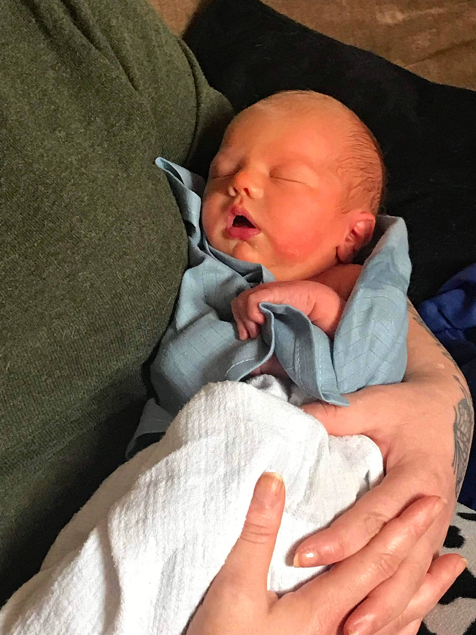 Koa is registered to the contest to win money with this photo: baby, baby_sleeping, baby_toddler_clothing, cheek, chin, comfort, ear, eye, eyebrow, finger, gesture, hand, human_body, mouth, nail, neck, nose, person, skin, thumb