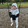 toddler, child, swing, playground, park, hoodie, smile, happy, outdoor, trees, grass, bench, woodchips, sunset, baby, clothing, feet, person, fun, nature