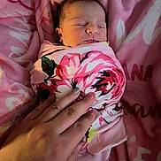 Ellieana joined the competition — help win amazing prizes! newborn, baby, sleeping, blanket, pink, hand, swaddle, floral_pattern, soft, cozy, infant, resting, tenderness, bed, closeup, cute, peaceful, person, skin, nail_polish