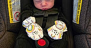 Braylee joined the competition — help win amazing prizes! baby, black_clothing, car_seat, child, closeup, cute, face, footwear, hands, headwear, indoors, infant, mittens, newborn, portrait, red_hat, red_socks, resting, safety_harness, sleeping