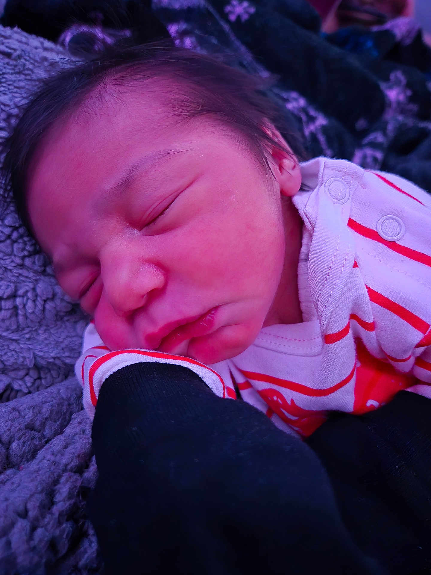 Braylee joined the competition — help win amazing prizes! baby, newborn, sleeping, face, closed_eyes, blanket, onesie, stripes, cozy, infant, skin, hair, cheek, mouth, portrait, closeup, fabric, arm, sleeve, resting