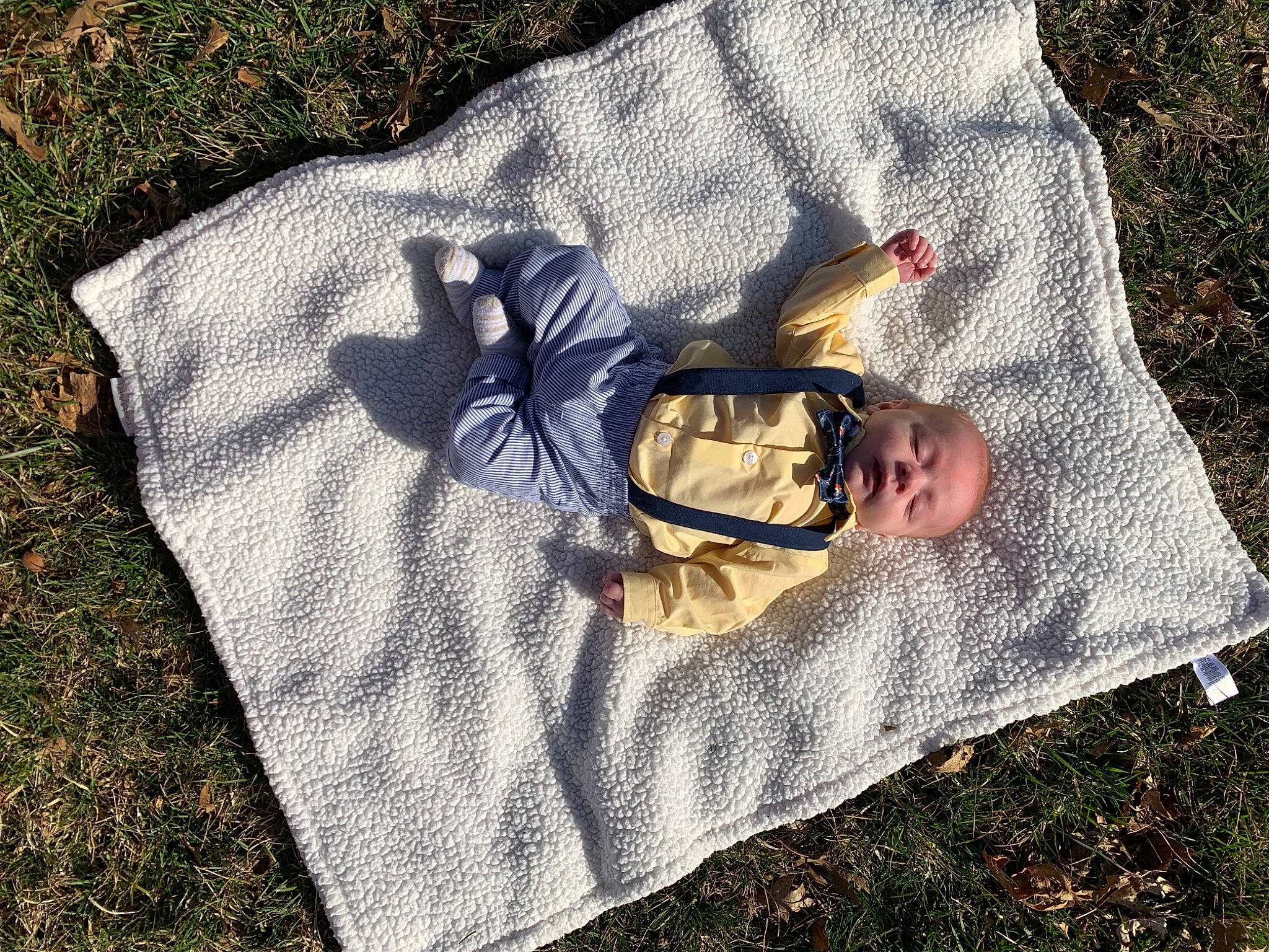 Keanu is registered to the contest to win money with this photo: child, comfort, fashion_accessory, fun, grass, grass_family, lawn, leisure, linens, pattern, people_in_nature, person, recreation, shade, shadow, sidewalk, sitting, soil, textile, tree