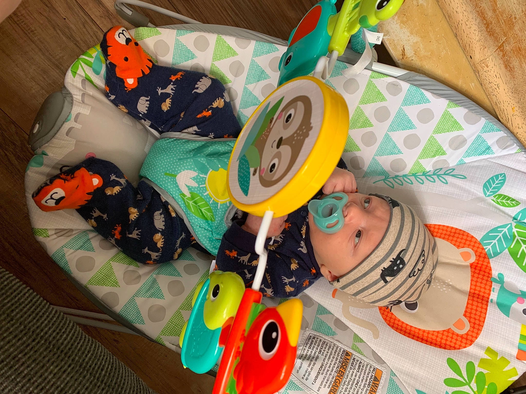 Keanu is registered to the contest to win money with this photo: art, baby, baby_products, baby_toys, child, circle, fashion_accessory, fun, happy, headwear, linens, party_supply, pattern, person, plastic, play, toddler, visual_arts