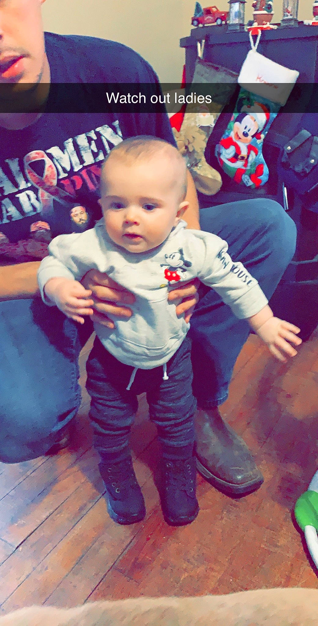 Konnor is registered to the contest to win money with this photo: arm, baby, cheek, child, cool, footwear, fun, jeans, person, photo_caption, photography, shoe, t_shirt, toddler