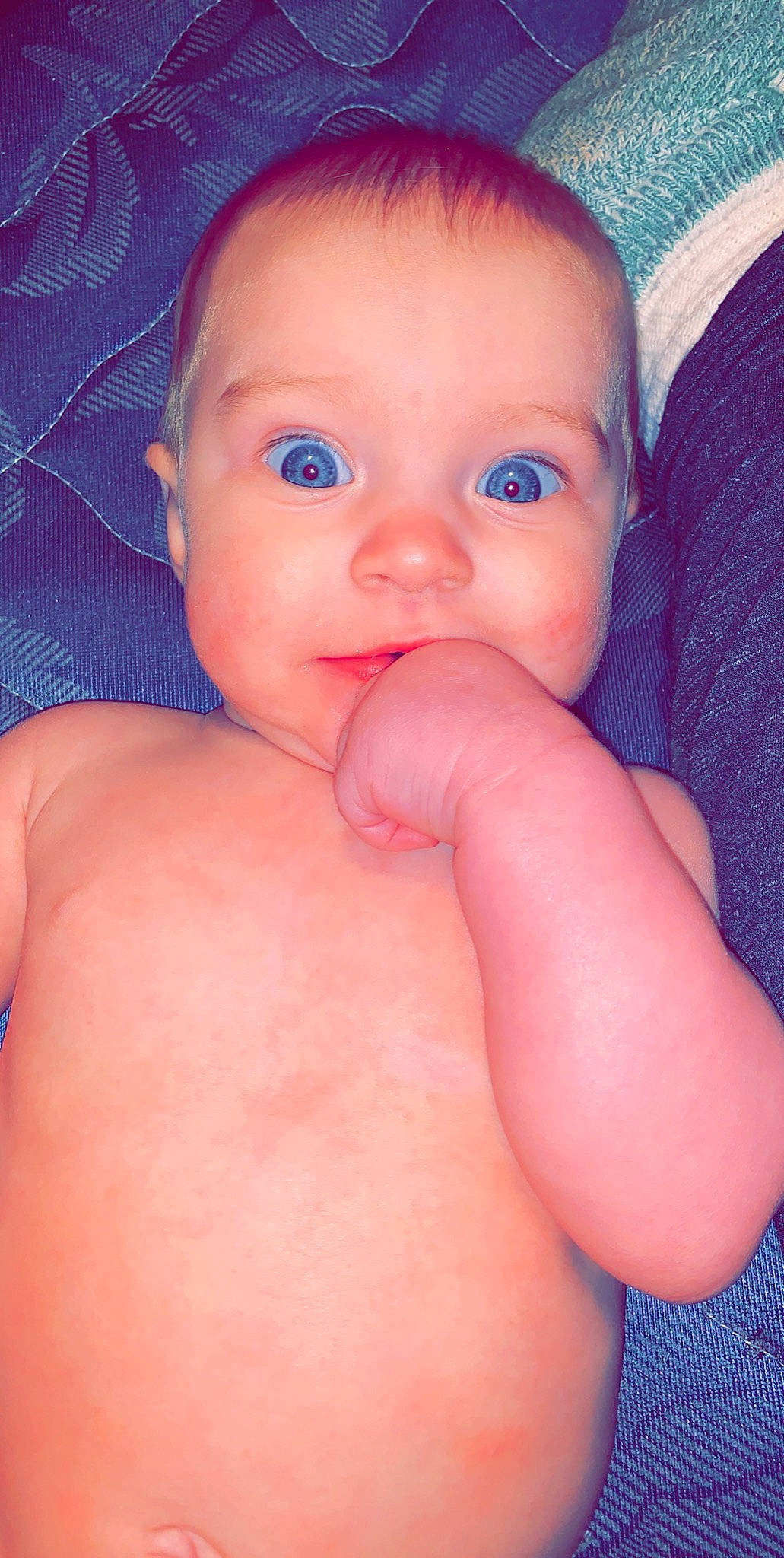 Madeleine is registered to the contest to win money with this photo: baby, cheek, child, chin, close_up, eye, face, finger, hand, head, leg, lip, mouth, muscle, neck, nose, person, pink, skin, thumb