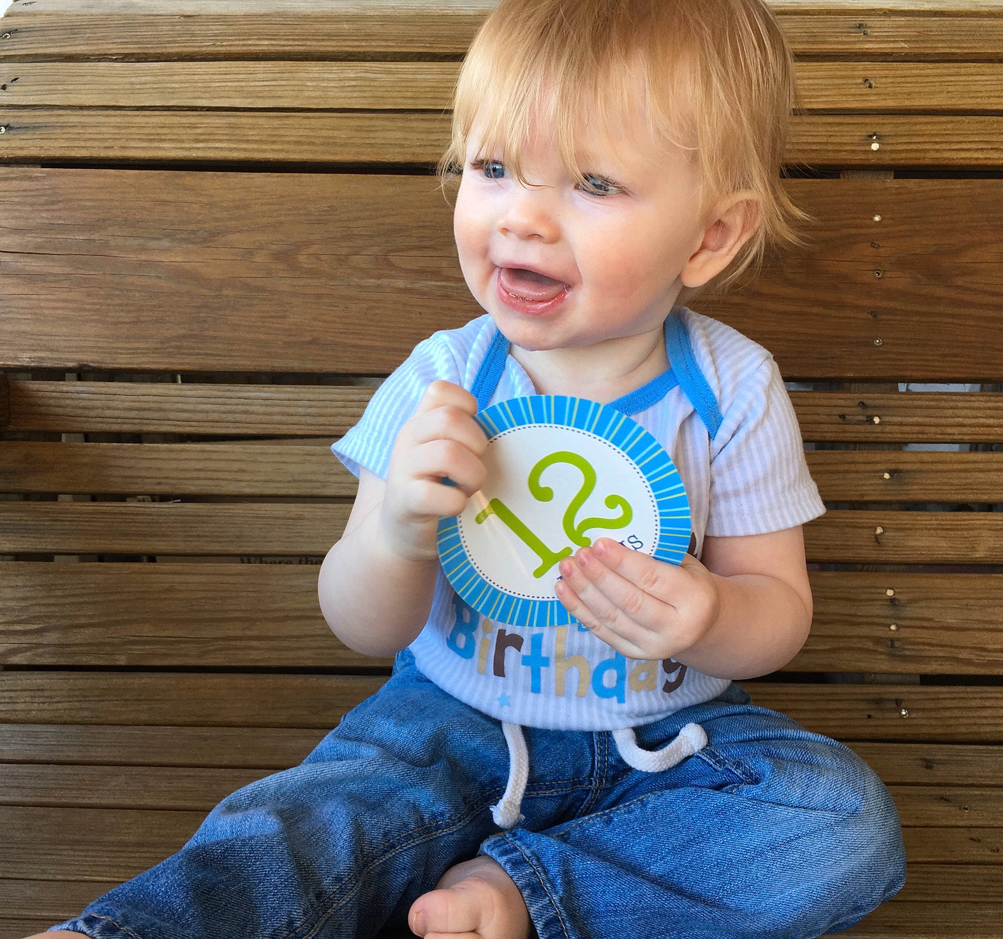 Damon is registered to the contest to win money with this photo: baby, baby_products, baby_toddler_clothing, child, jeans, person, play, product, sitting, t_shirt, toddler, toy
