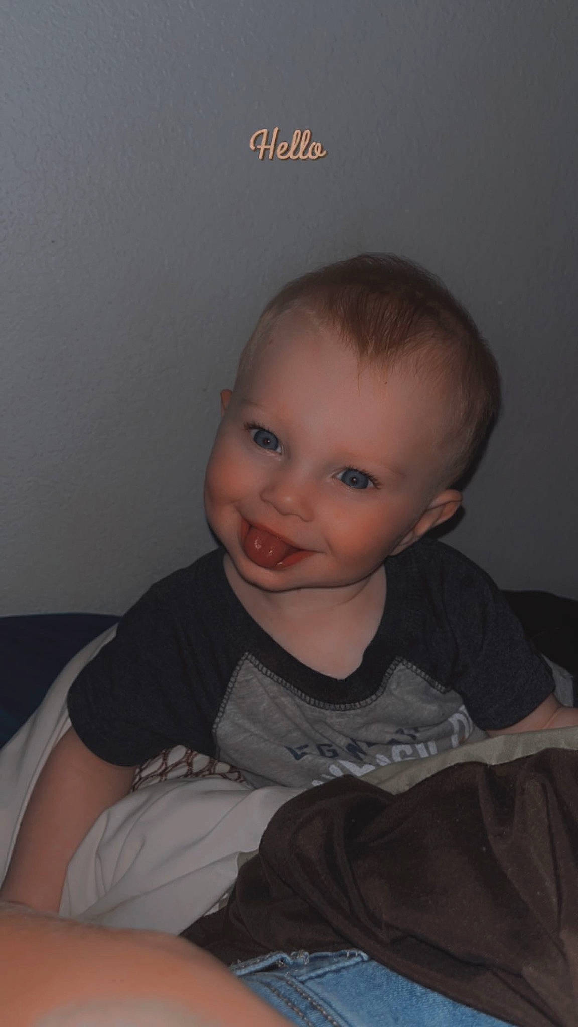 Jaxon is registered to the contest to win money with this photo: baby, baby_toddler_clothing, cheek, chest, child, comfort, eyebrow, flash_photography, forehead, fun, happy, iris, joy, mouth, nose, person, sitting, skin, sleeve, smile
