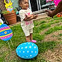 Ava joined the competition — help win amazing prizes! child, toddler, grass, outdoor, toy, easter_egg, polka_dot, pink_shoes, shorts, tshirt, hair_bun, smile, hands, adult, plant_pot, holiday, decoration, celebration, fun, play