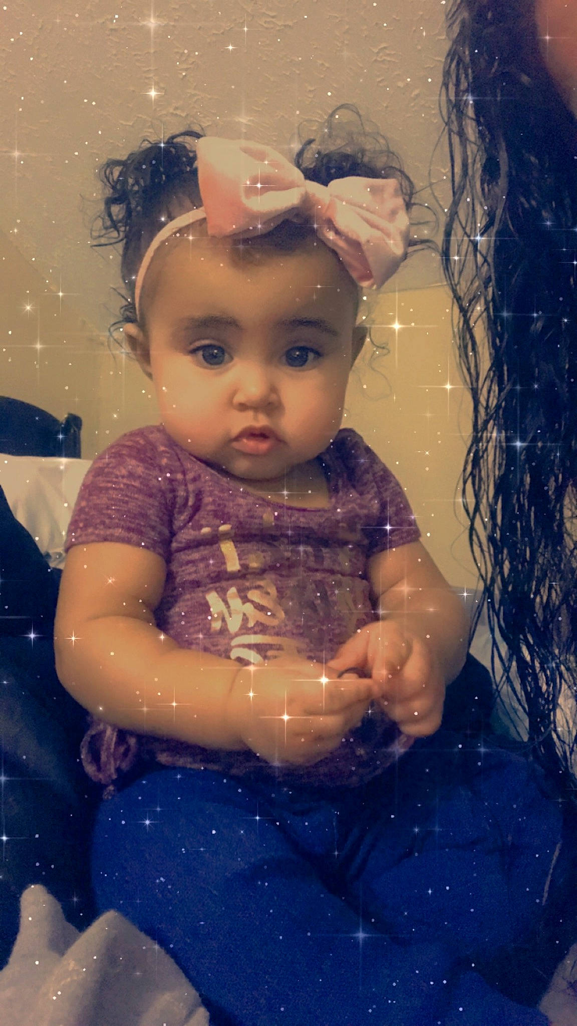 Amiah is registered to the contest to win money with this photo: baby, cheek, child, ear, eye, face, forehead, fun, hair_accessory, head, iris, nose, person, skin, smile, toddler