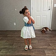 Jheselyn joined the competition — help win amazing prizes! child, cute, denim_vest, dog, door, dress, floor, footwear, girl, happy, indoor, mat, person, pet, pose, sandals, smile, wall, white_dress, wooden_floor
