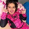 Jheselyn is registered to the contest to win money with this photo: blanket, casual, child, costume, couch, dress, expression, fabric, face, fun, hair, hand_sign, happy, indoor, person, pink, playful, smiling, spiderman, tongue_out