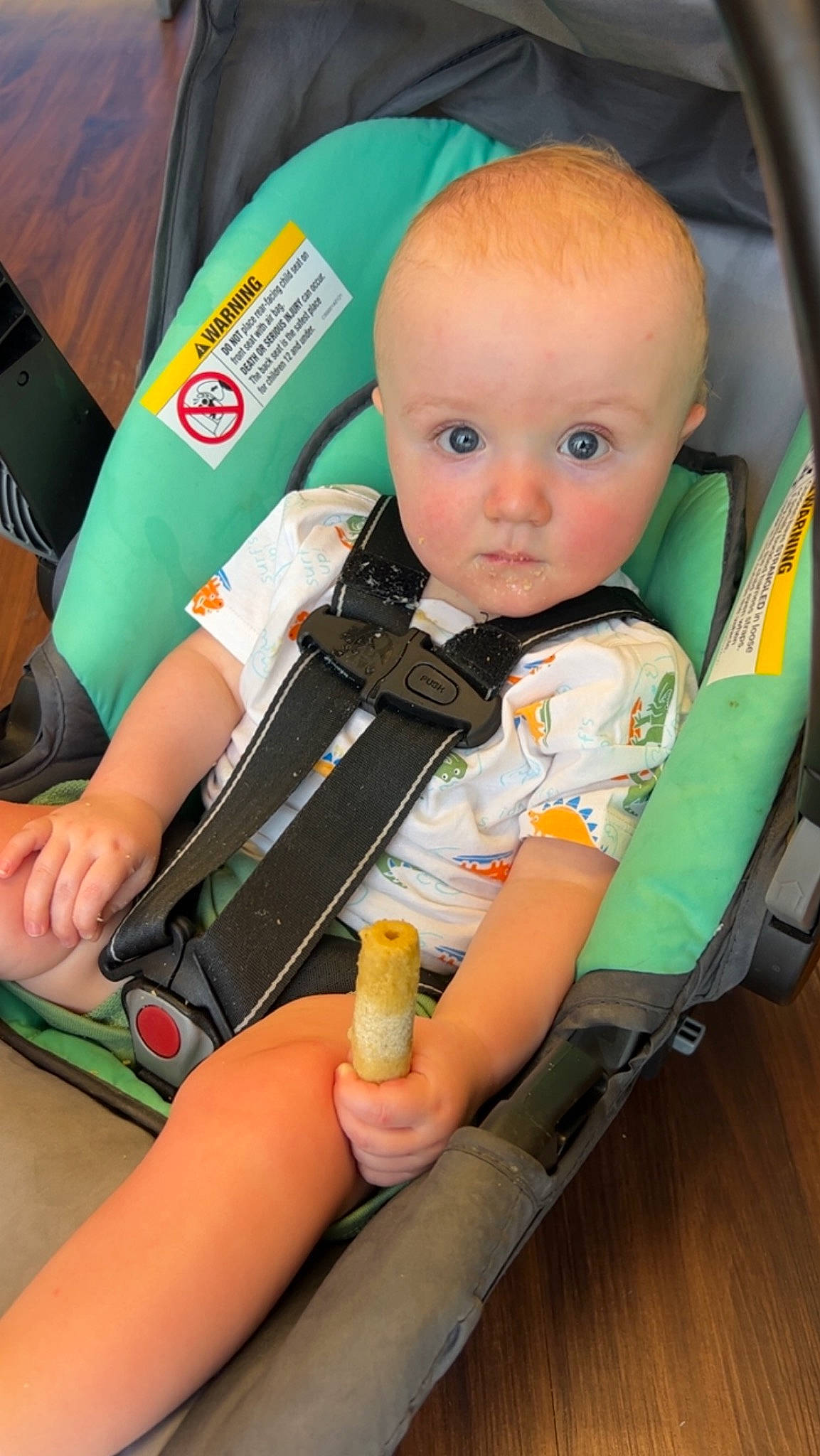 Samuel joined the competition — help win amazing prizes! baby, baby_carriage, baby_products, baby_safety, car_seat, chair, cheek, child, comfort, fun, green, motor_vehicle, orange, person, room, seat_belt, service, sitting, surprise, thumb