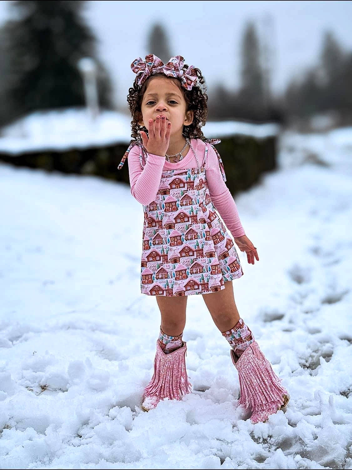 Alaya is registered to the contest to win money with this photo: arm, dress, eye, fashion_design, flash_photography, footwear, freezing, hair, happy, head, human_body, jeans, leg, long_hair, people_in_nature, person, skin, sleeve, snow, toddler