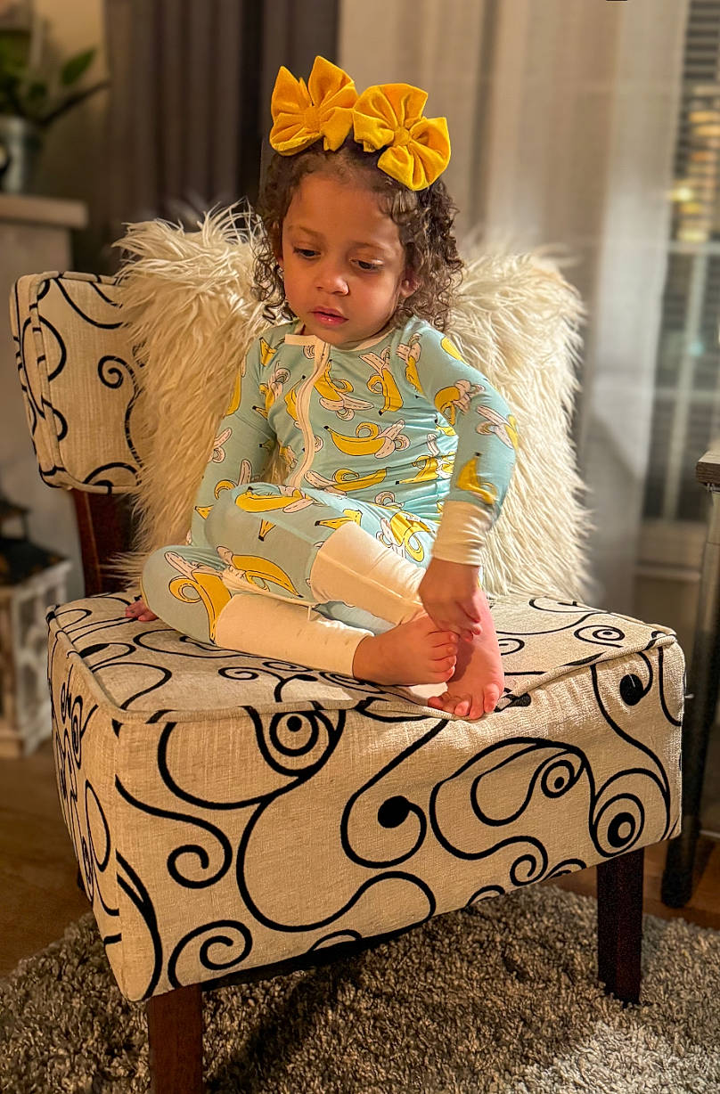 Kyiah joined the competition — help win amazing prizes! baby_toddler_clothing, beauty, child, event, fashion, fashion_accessory, fashion_design, fun, happy, headband, headpiece, houseplant, jewellery, magenta, necklace, party_supply, person, pink, plant, sitting